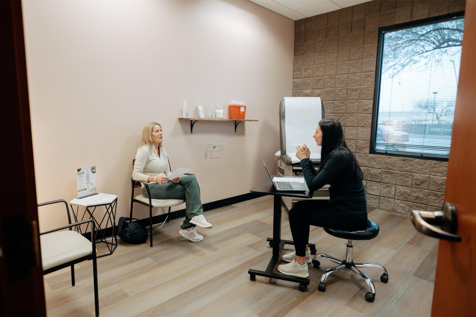 A physician consultation in an exam room at Protea Medical Center